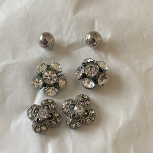 Three pairs of silver toned / rhinestone stud earrings